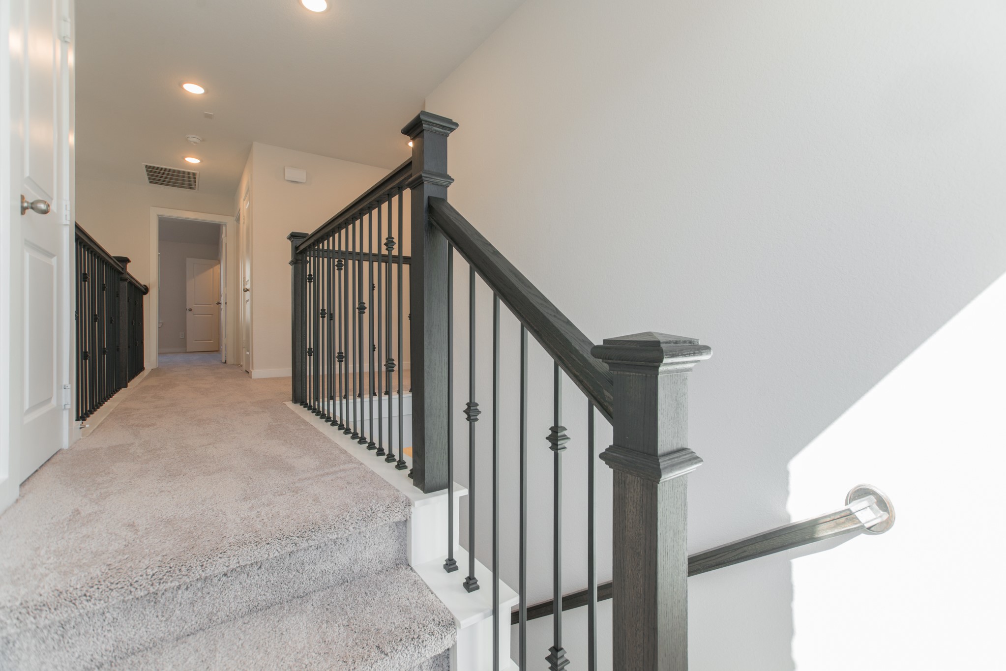 17138 Crimson Crest Drive Conroe, TX 77302 - Photo 39 of 50 a view of staircase with railing and white walls