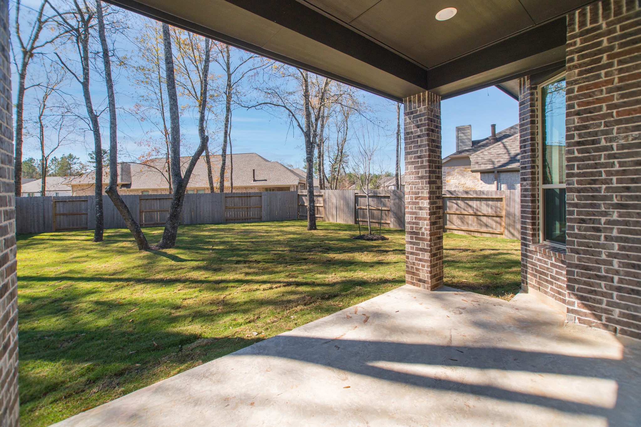 17138 Crimson Crest Drive Conroe, TX 77302 - Photo 40 of 50 a swimming pool with an outdoor space and seating