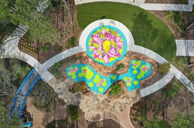 an aerial view of house with yard swimming pool and outdoor seating