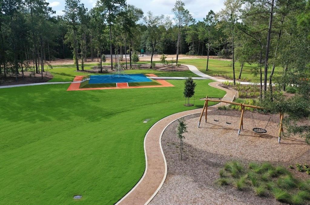 17138 Crimson Crest Drive Conroe, TX 77302 - Photo 49 of 50 a view of a park with swings