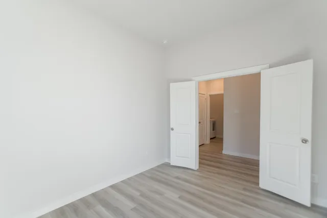 a view of an empty room and window