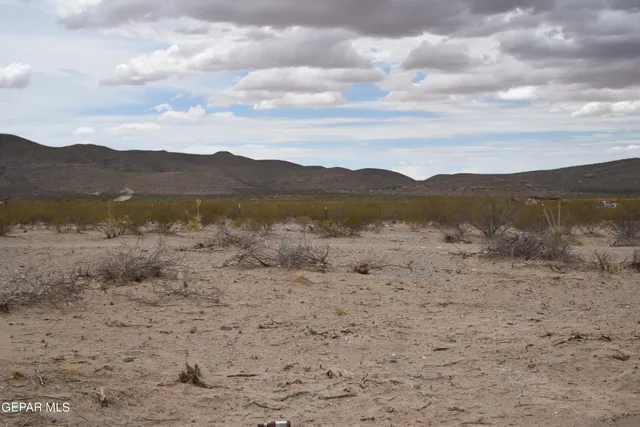 a view of mountain and a beach