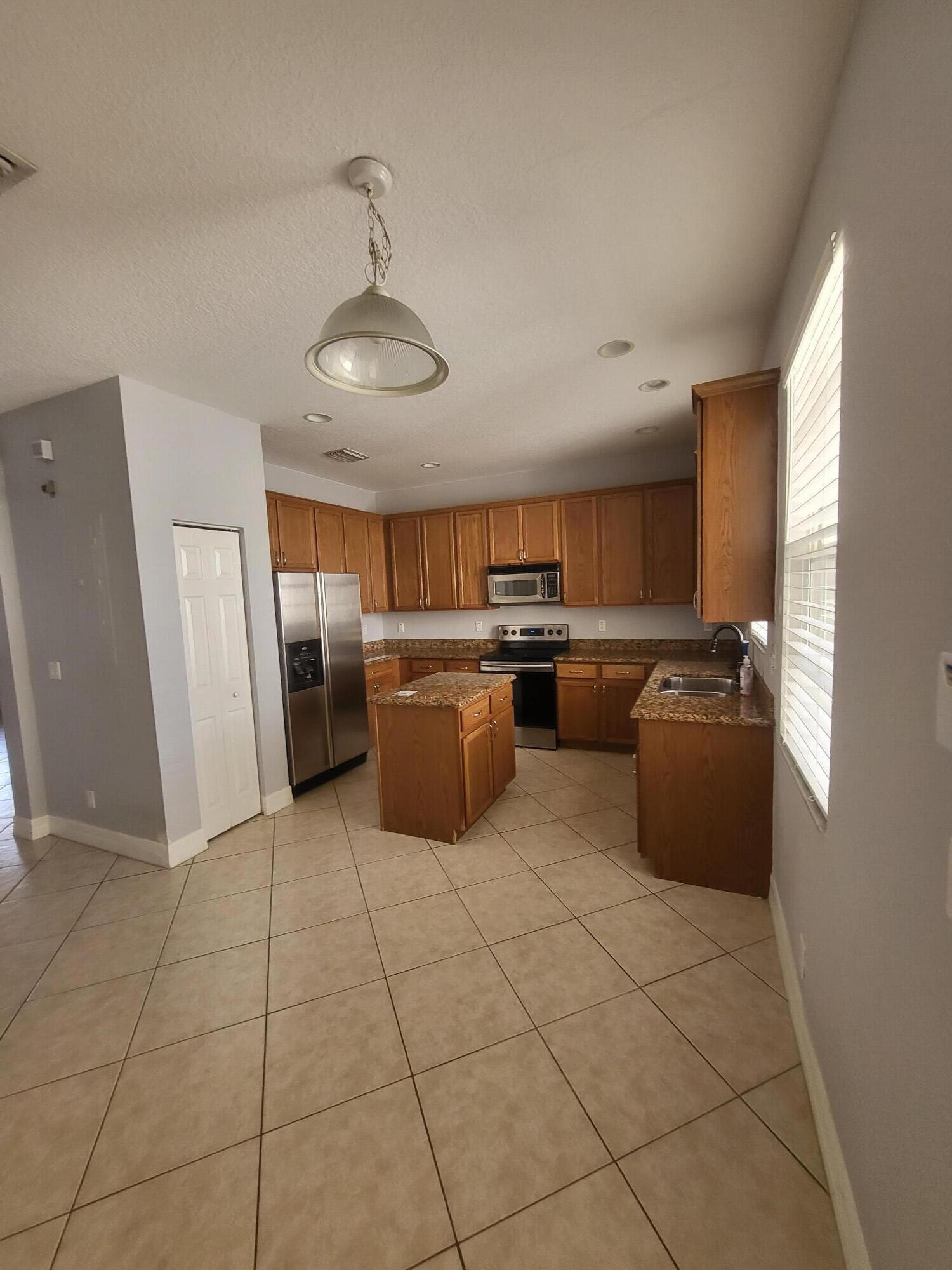 1053 Northwest 18th Avenue Boca Raton, FL 33431 - Photo 6 of 34 20231112_105928