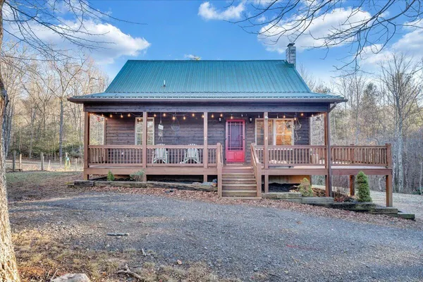 a view of balcony with wooden floor