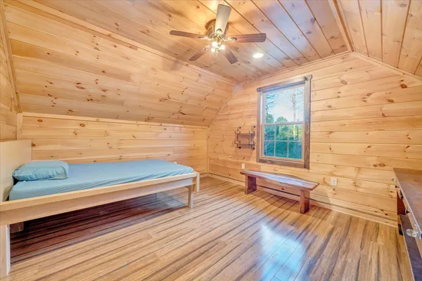 a view of a balcony with wooden floor