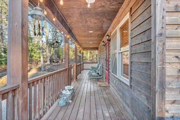 a view of balcony with furniture