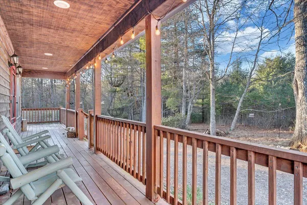 a view of a room with outdoor seating