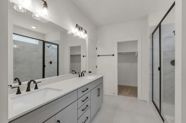 a view of a room with wooden floor and entryway