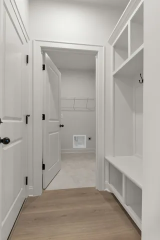 a view of an empty room and a window