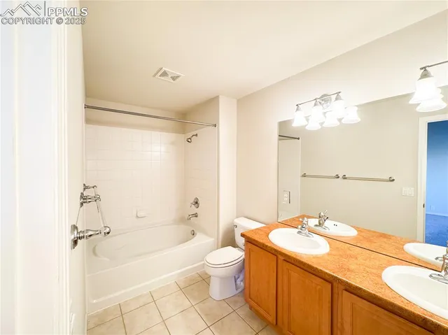 a view of a kitchen with a sink