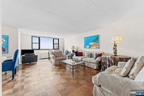 a living room with furniture and a couch