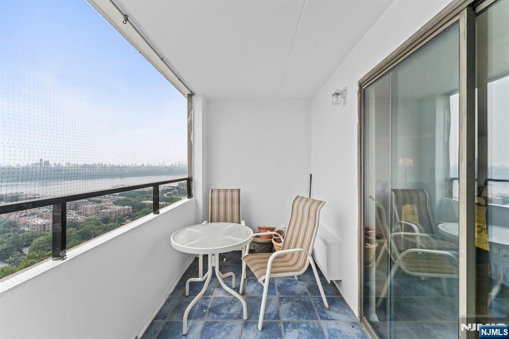 250 Gorge Road, Unit 14J Cliffside Park, NJ 07010 - Photo 21 of 45 a view of a balcony with chairs