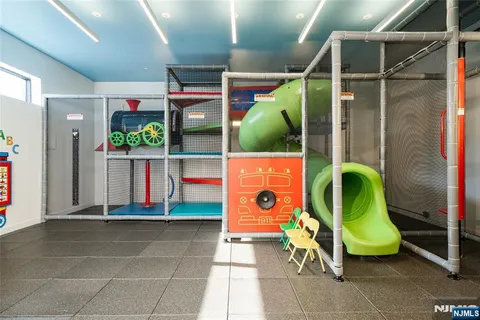 a large room with gym equipment