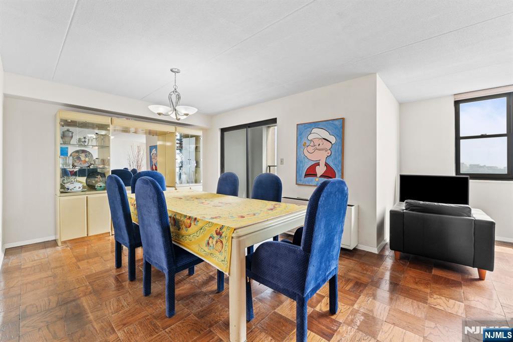 250 Gorge Road, Unit 14J Cliffside Park, NJ 07010 - Photo 4 of 45 a view of a dining room with furniture