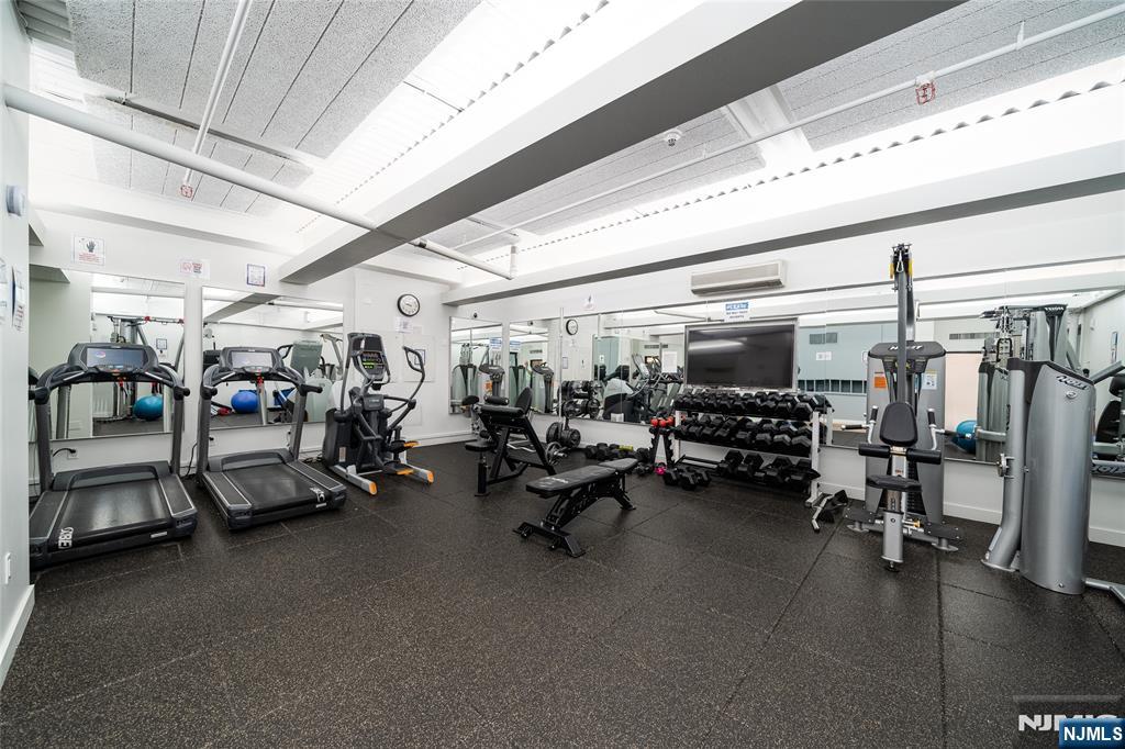 250 Gorge Road, Unit 14J Cliffside Park, NJ 07010 - Photo 41 of 45 a view of a room with gym equipment