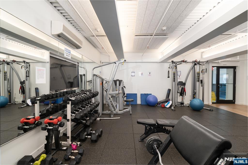 250 Gorge Road, Unit 14J Cliffside Park, NJ 07010 - Photo 42 of 45 a view of a room with gym equipment