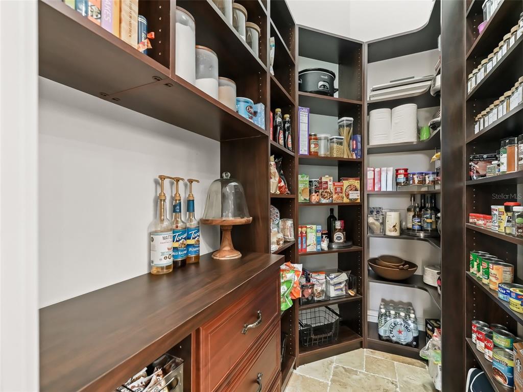 3848 Northwest 85th Terrace Ocala, FL 34482 - Photo 21 of 62 a kitchen with lots of clutter and stainless steel appliances