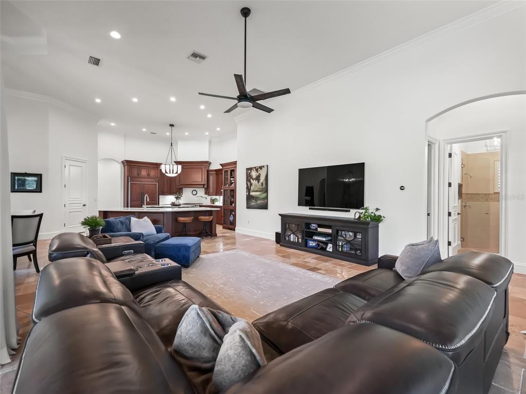 3848 Northwest 85th Terrace Ocala, FL 34482 - Photo 23 of 62 a living room with furniture and a flat screen tv