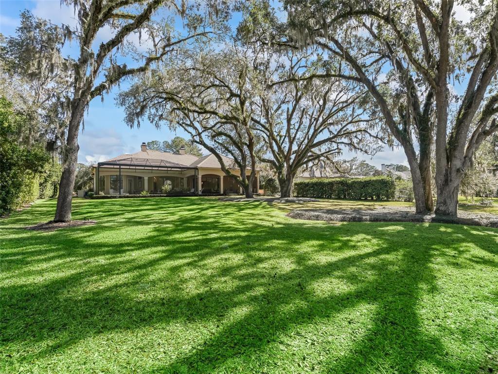3848 Northwest 85th Terrace Ocala, FL 34482 - Photo 28 of 62 a front view of house with yard and green space