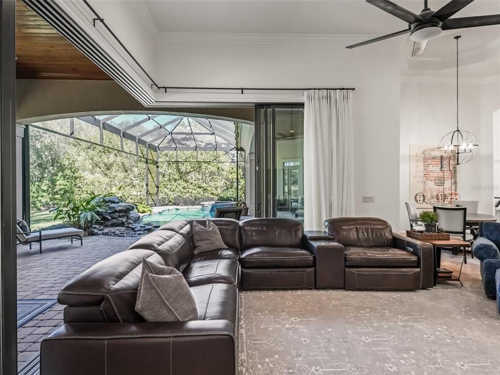3848 Northwest 85th Terrace Ocala, FL 34482 - Photo 37 of 62 a living room with furniture and a large window