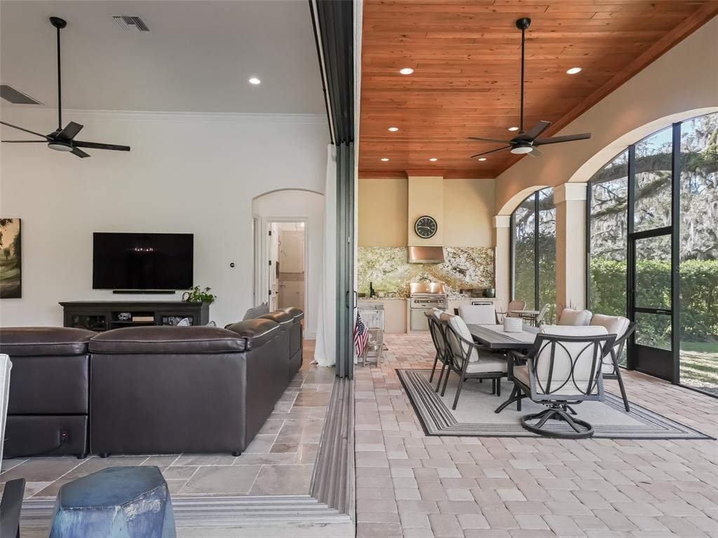 3848 Northwest 85th Terrace Ocala, FL 34482 - Photo 39 of 62 a view of a dining room with furniture window and wooden floor