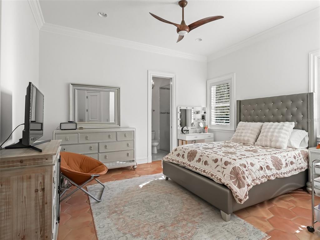 3848 Northwest 85th Terrace Ocala, FL 34482 - Photo 45 of 62 a bedroom with a bed a couch and dresser