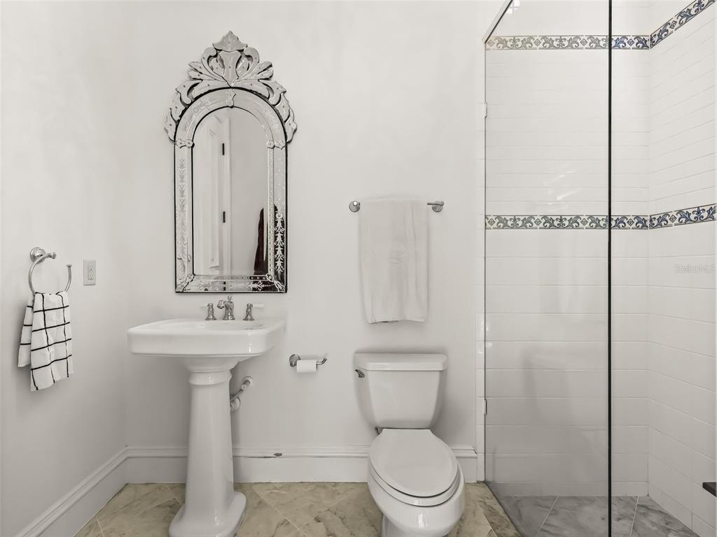 3848 Northwest 85th Terrace Ocala, FL 34482 - Photo 46 of 62 a bathroom with a sink toilet and shower