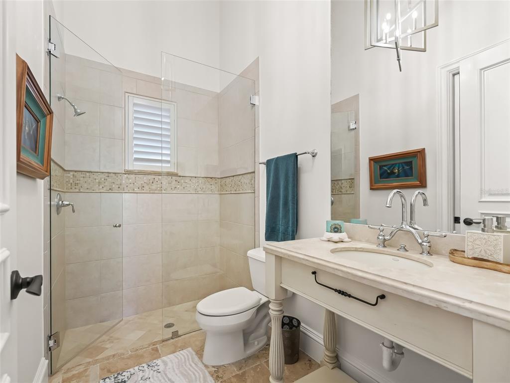 3848 Northwest 85th Terrace Ocala, FL 34482 - Photo 48 of 62 a bathroom with a sink toilet and shower