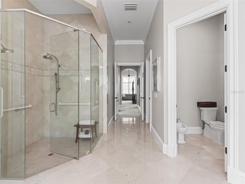 3848 Northwest 85th Terrace Ocala, FL 34482 - Photo 49 of 62 a bathroom with a shower and a toilet