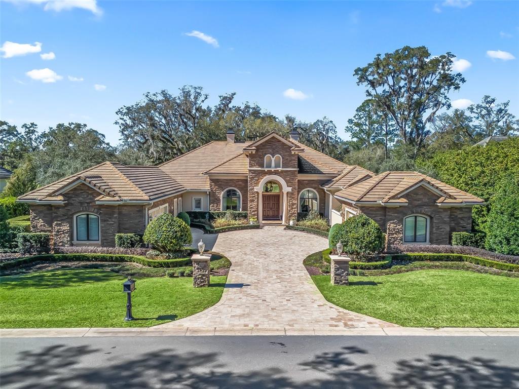 3848 Northwest 85th Terrace Ocala, FL 34482 - Photo 62 of 62 a front view of a house with a yard