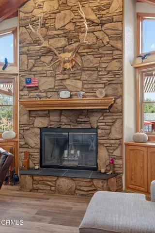 a kitchen with stainless steel appliances granite countertop a stove and a refrigerator