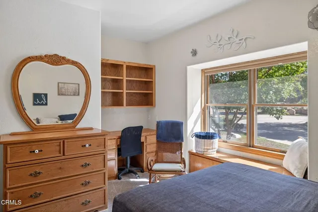 a bathroom with a double vanity sink and mirror