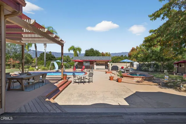 an aerial view of a house with a garden
