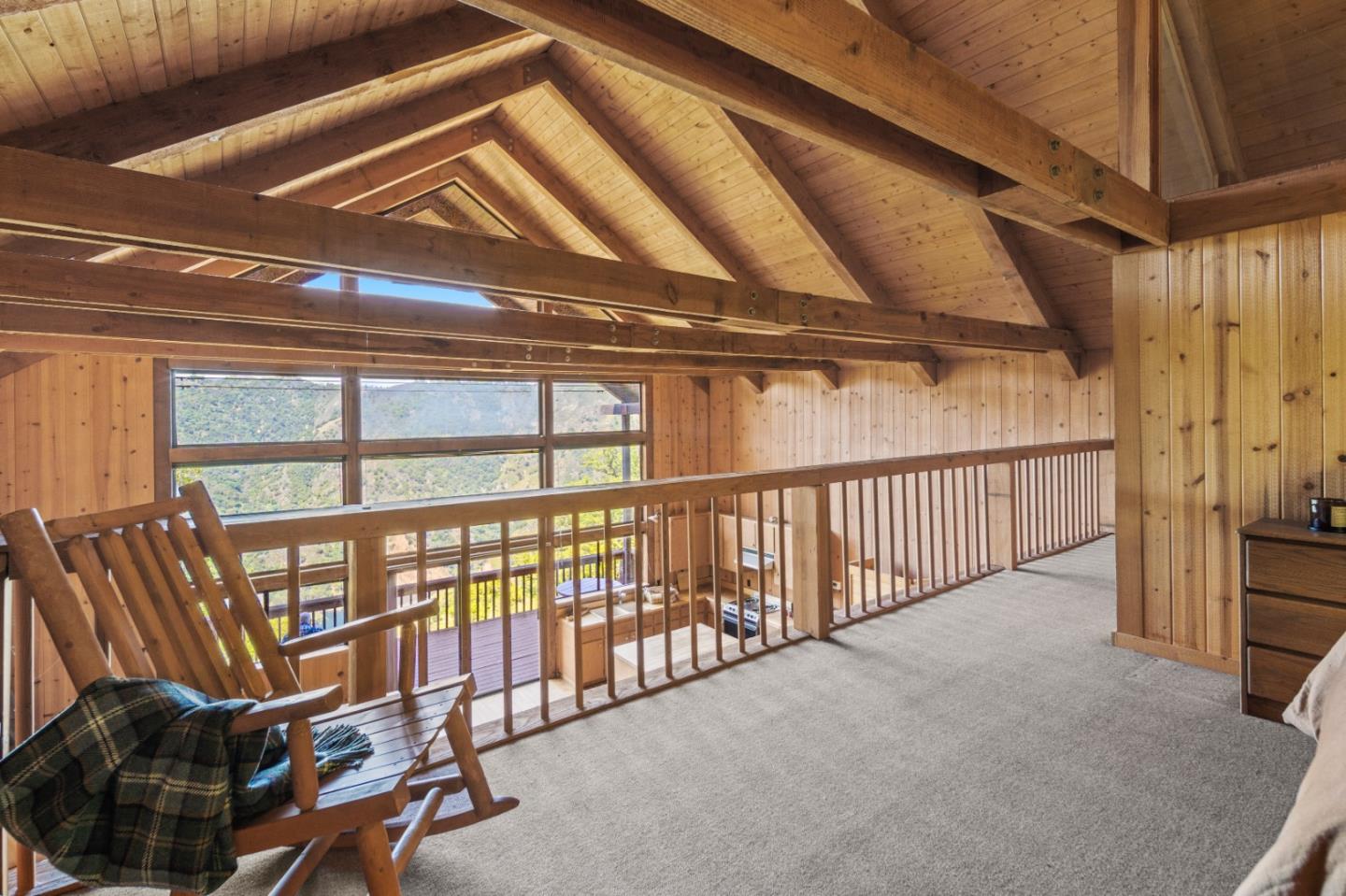 38225 Nason Road Carmel Valley, CA 93924 - Photo 12 of 29 a view of a hallway with wooden floor