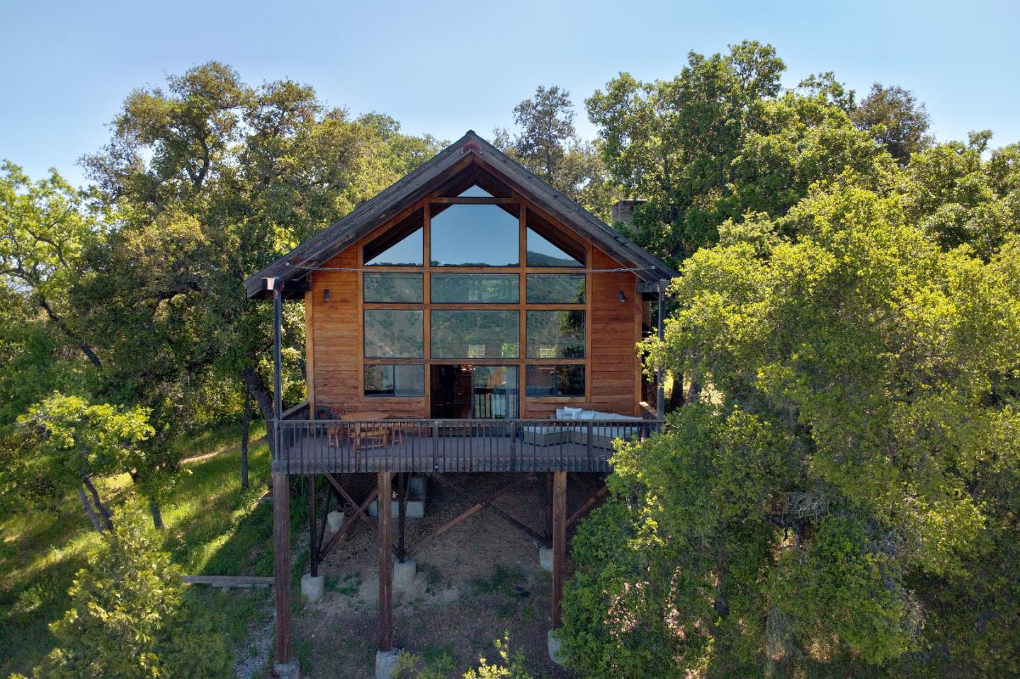 38225 Nason Road Carmel Valley, CA 93924 - Photo 2 of 29 a view of a house with a yard and sitting area