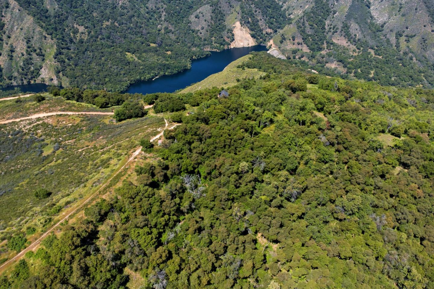 38225 Nason Road Carmel Valley, CA 93924 - Photo 26 of 29 a view of a field with a tree