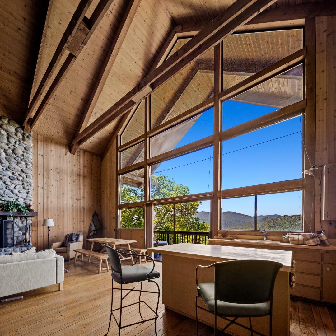 38225 Nason Road Carmel Valley, CA 93924 - Photo 9 of 29 a dining room with furniture and floor to ceiling windows