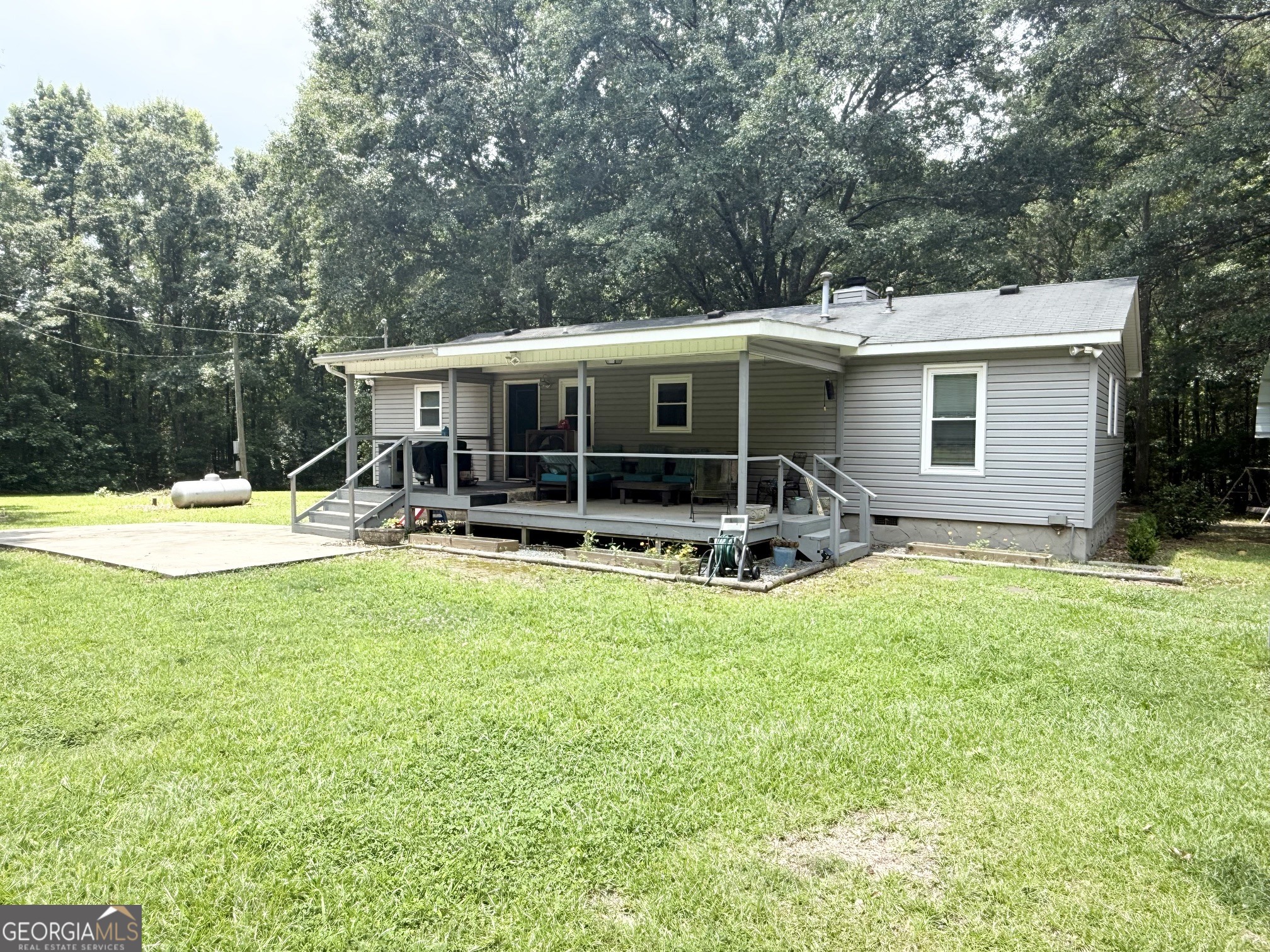 62 Melvin Harris Road Manchester, GA 31816 - Photo 49 of 52 a view of a house with backyard porch and sitting area