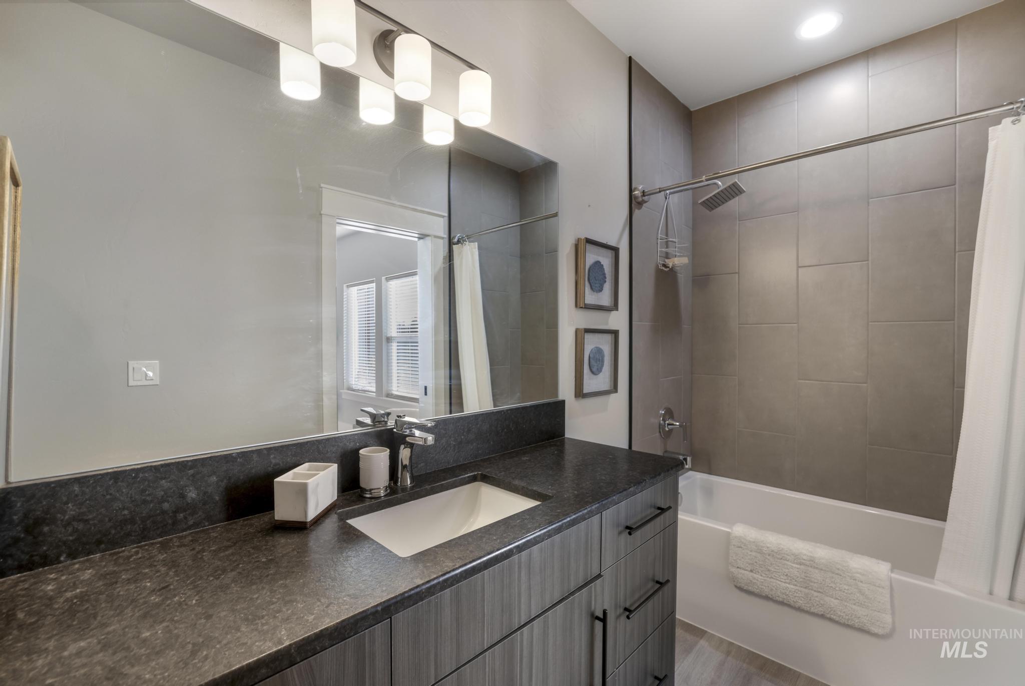 439 Meadowview Lane Twin Falls, ID 83301 - Photo 25 of 48 Full bathroom with shower / tub combo and vanity