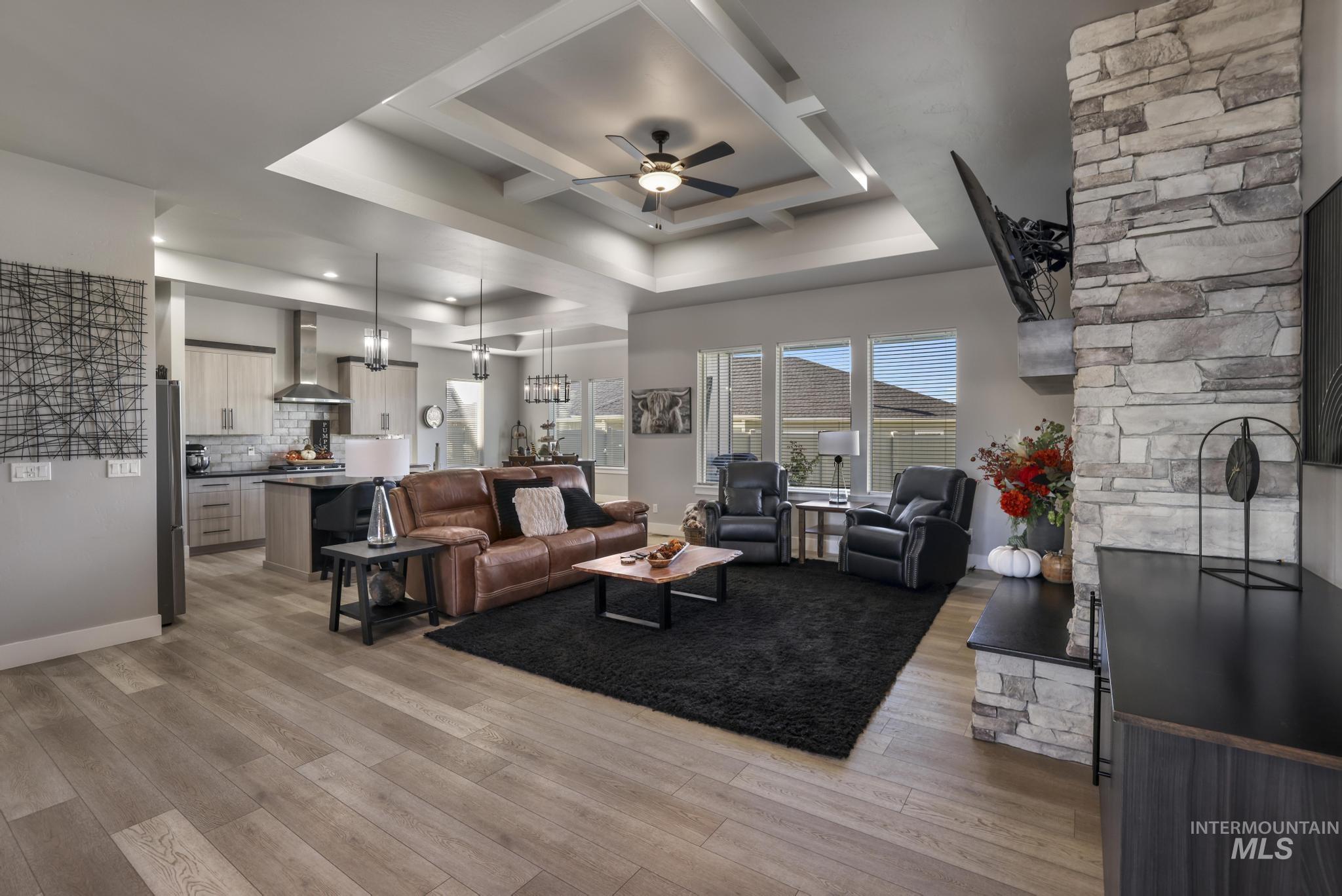 439 Meadowview Lane Twin Falls, ID 83301 - Photo 6 of 48 Living area featuring ceiling fan and light wood-style flooring