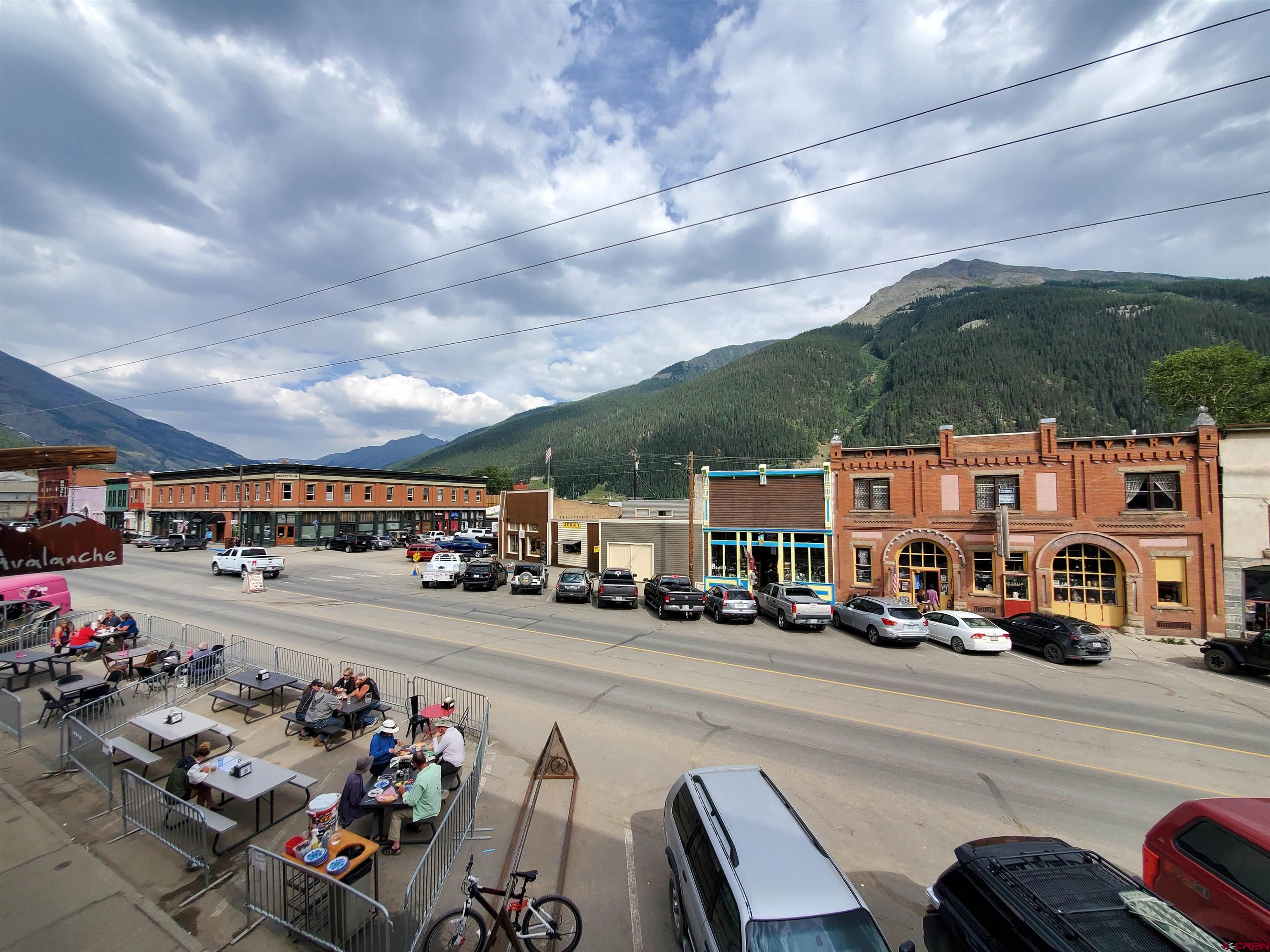 1145 Greene Street Silverton, CO 81433 - Photo 14 of 15 a city street lined with cars parked in front of it