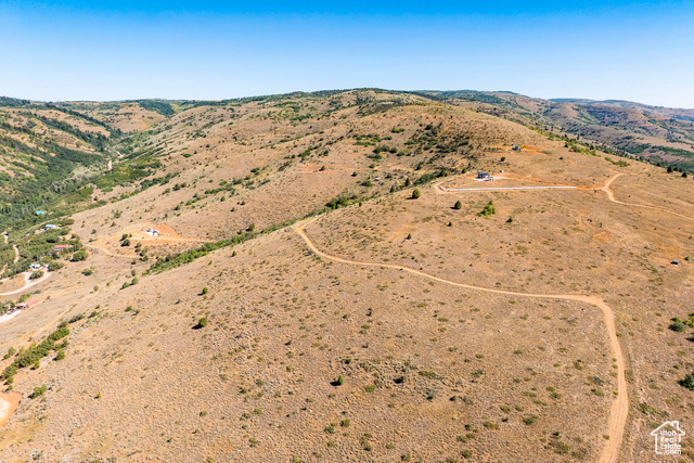 3243 Oak Canyon Road, Unit 488 Huntsville, UT 84317 - Photo 18 of 28 Aerial view of property's location featuring rural landscape and a mountainous background