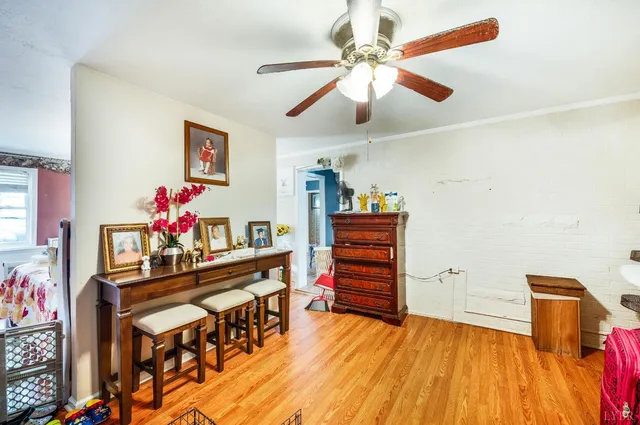 a bedroom with furniture and a chandelier