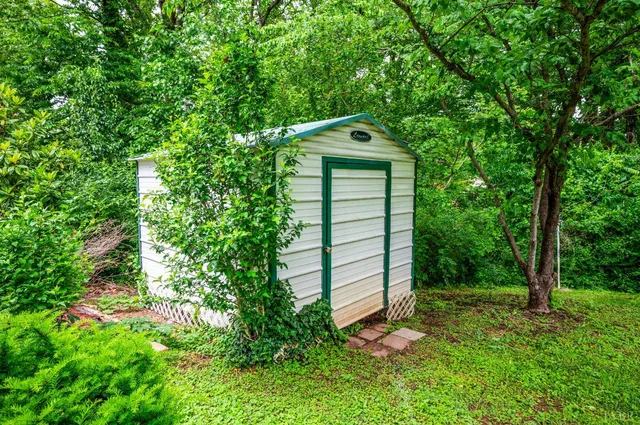a view of a deck with chair and wooden floor