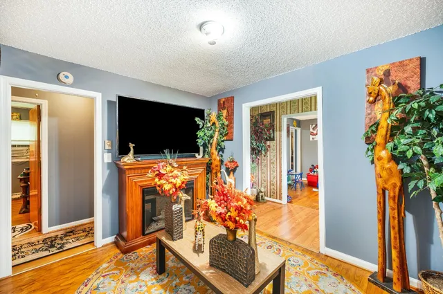 en empty room with windows table and chairs