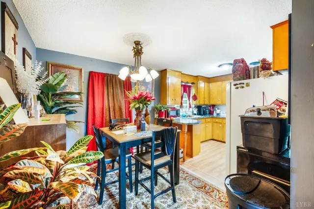 a room with musical instrument pool table and windows