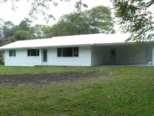 a front view of a house with yard