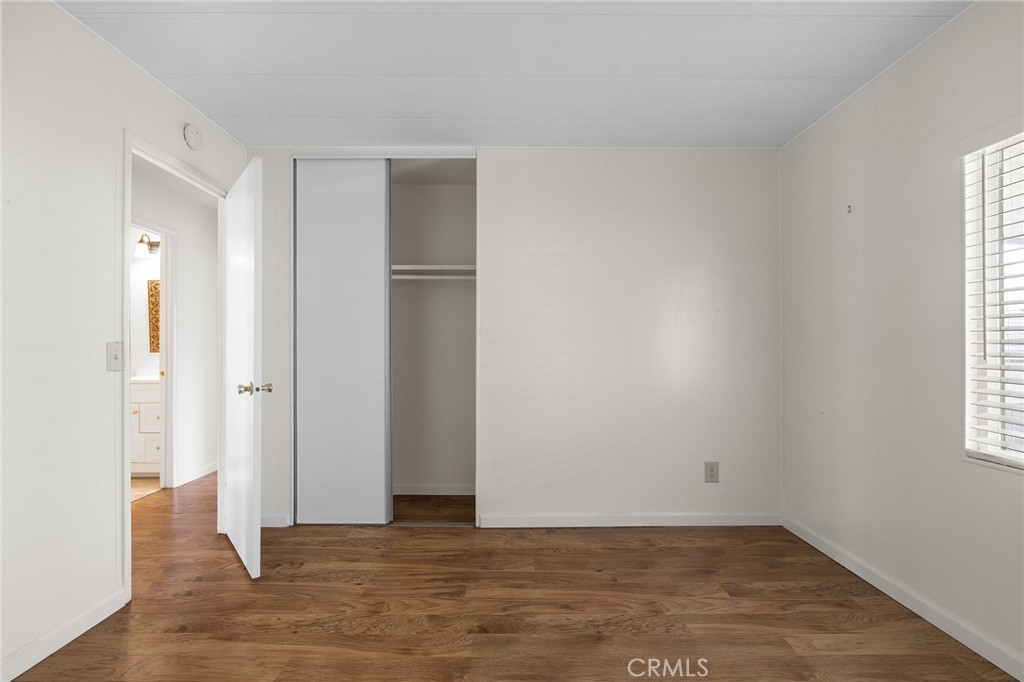 1901 Dayton, Unit 128 Chico, CA 95928 - Photo 16 of 44 an empty room with windows and closet