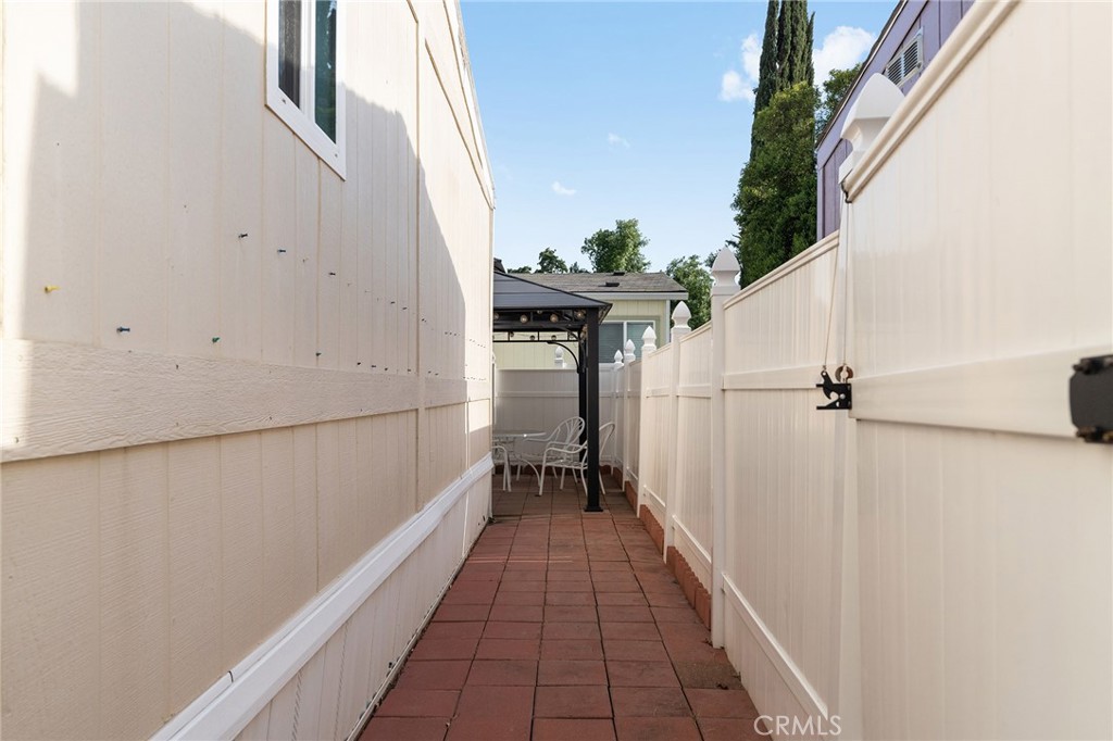 1901 Dayton, Unit 128 Chico, CA 95928 - Photo 32 of 44 a view of a balcony with wooden floor