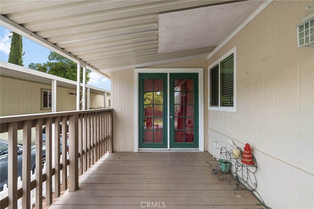 1901 Dayton, Unit 128 Chico, CA 95928 - Photo 4 of 44 a view of a porch with wooden stairs